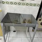 قاعدة حديد للشاي جمر