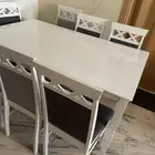 طاولة طعام مع 7 كراسي