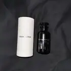 عطر لويس فيتون اصلي فيه فوق النص معه كرتونه موضح في الصوره