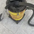 مكنسة كهربائية وكوايه