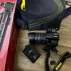 كاميرا نيكون مع عدسة زوم واسعة Nikon D3200