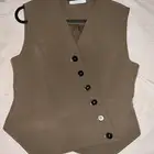 بلوزة بلا اكمام