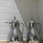 مواعين وتحف ومكنسه كهربائيه جديده