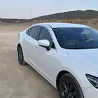 مازدا 2025 اللون أبيض الممشى 30