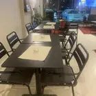 كراسي وطاولات كوفي