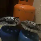 قنينة غاز كبيرة و قنينتين غاز صغيرة