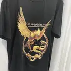 تيشيرت و دبوس The hunger games
