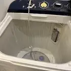 غسالة نشافتها كويسة لكن الحوض الاخر خربان