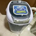 غسالة ملابس صغيره