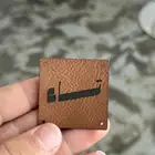 طباعة لوقو جلد للعبايات ليبل قماش بكجات