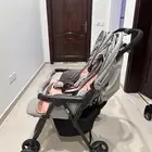 عربة أطفال توأم