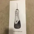 للبيع خيط أسنان مائي