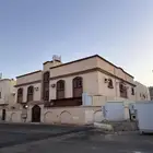 عمارة سكنية للبيع في حي المطار