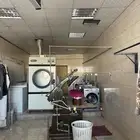 محل مغسلة ملابس متكامله بجميع ملحقاتها