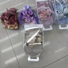 باقات ورد معطر فاخر   تصميم أنيق داخل علبة هدية شفافة