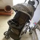 عربة أطفال وكرسي