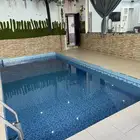 استراحة قسمين بمسبحين كبار وصغار وألعاب مائيه وملعب صابوني