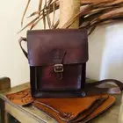 شنطه جلد طبيعي جمل قيمه شغل يدوي