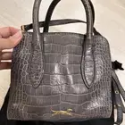 شنطة رمادية ماركة اسبانيه
