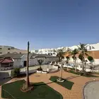 قاعة مع ارض للبيع متلاصقة