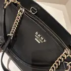 شنطه نسائية ماركة دي كي أن واي أصلية كبيره بحجم الآيباد