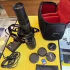 كامرة كانون D1300 مع عدسة أضافية كبيرة ودقة في التصوير