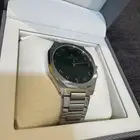 ساعه فضيه من داخل اخضر