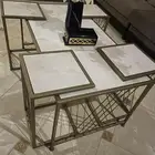 4 طاولات مو وحده كبيره - خمس لوحات بمرايه - ستاند