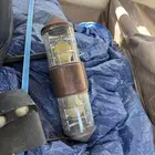 باب حديد وعشب صناعي واثاث متنوع