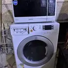 غساله اتوماتيك وتلفزيون ومايكرويف