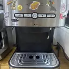 مكينة اسبريسو وطاحونة وملحقاتها