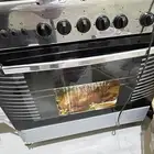 فرن كهربائي ودفاية ومكنسة