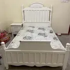 سرير وطوله تلفزيون