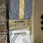 بكج مكون من بشت وغتره وقلم وكبك ومسباح