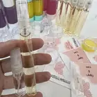 توزيعات عطور مع كرت ثيم طباعه خمريات هدايا