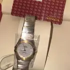 ساعة أوميجا نسائية وسلسال وأسوارة فان كليف