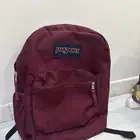 شنطة جان سبورت jansprt شنطة حمراء برقندي