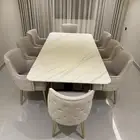 طاولة طعام 8 كراسي بحالة الجديد بداعي السفر لم تستخدم