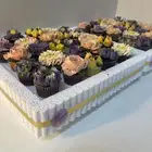 توزيعات ميني كب كيك على شكل ورد ( للاكل)