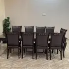 طاولة طعام مكونه من 9 كراسي