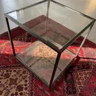 طاولات العدد 2 للبيع حديد اسود مع زجاج