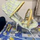 كرسي هزاز وطاولة
