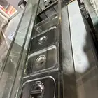 2 فليزر واحد كبير وواحد صغير 2 طاوله وسخان بوفيه وجريل