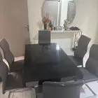 طاولة طعام زجاج مع ست كراسي حسب السوم