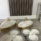 صحون مكسرات جديده الاستخدام مرتين وكل حبه منها 7 قطع