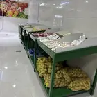 رفوف خضار  كاميرا محل  طاولة ستيل   ميزان   كاشير وطاولة