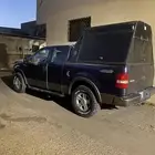 سيارة مجهزه لرحلات تحمل لوحه مميزه