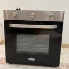 فرن كهربائي تشغيل غاز