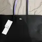 شنطة لاكوست جديده ما استخدمتها ولا مره