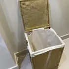 سلة غسيل لون ذهبي حديد استعمال خفيف ونظيف